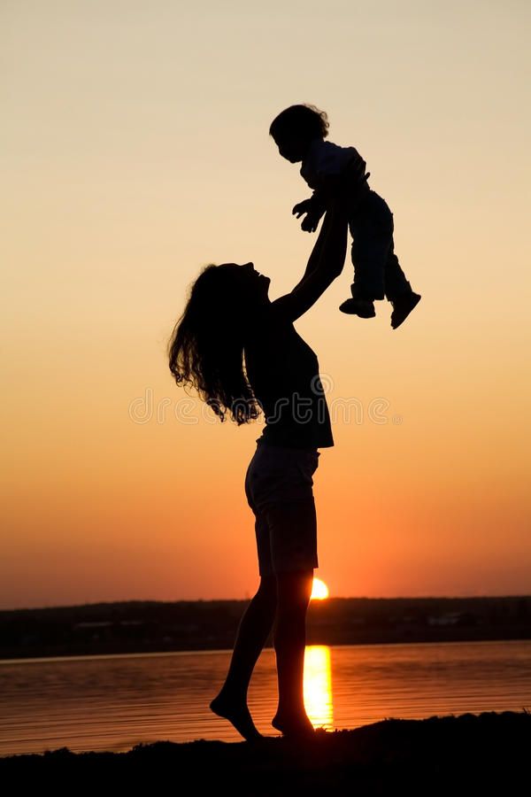 mother holding baby